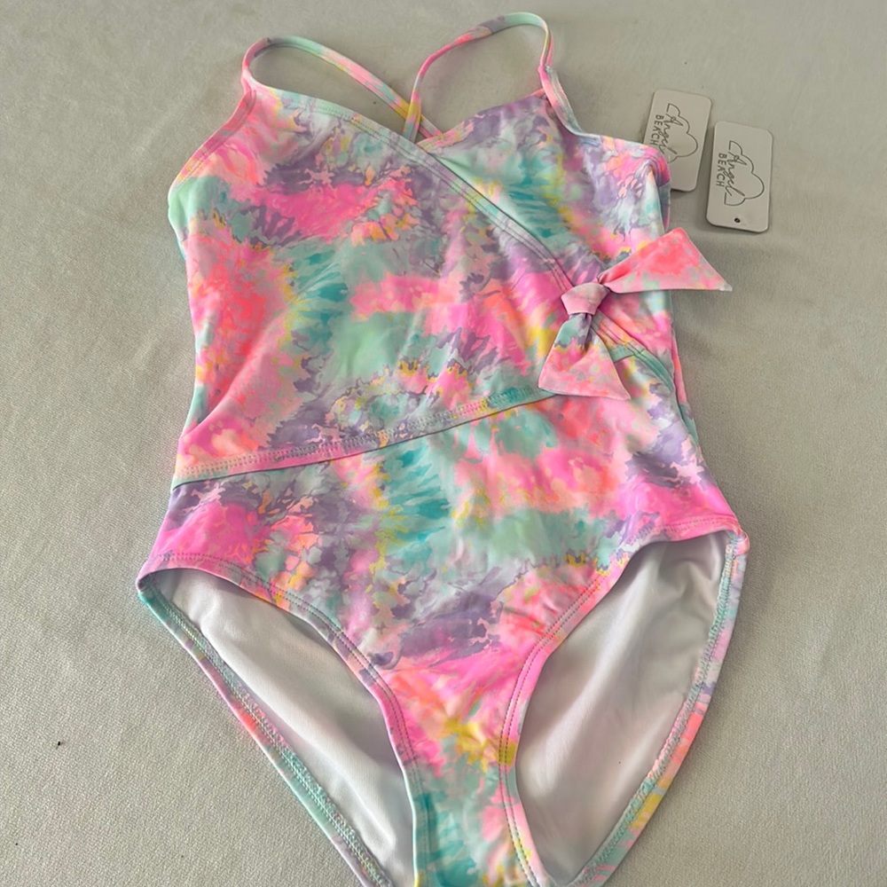 New never worn girls one piece swimsuit  multi colored.